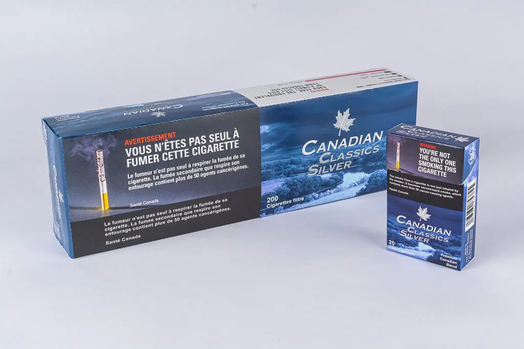 A Carton of Canadian Classics Silver Cigarettes Next to a Pack